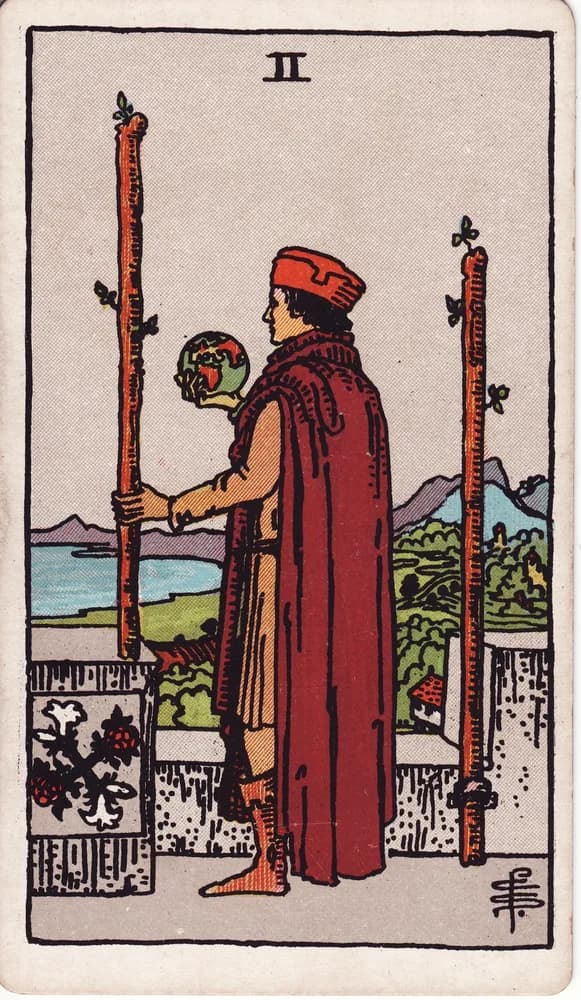 완드 2 (Two of Wands) — RWS 1909