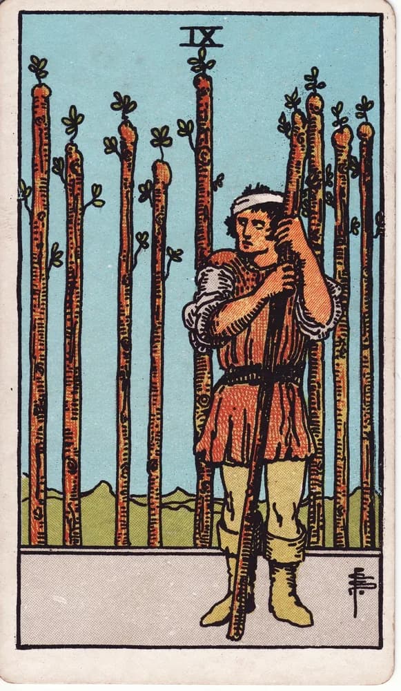 완드 9 (Nine of Wands) — RWS 1909